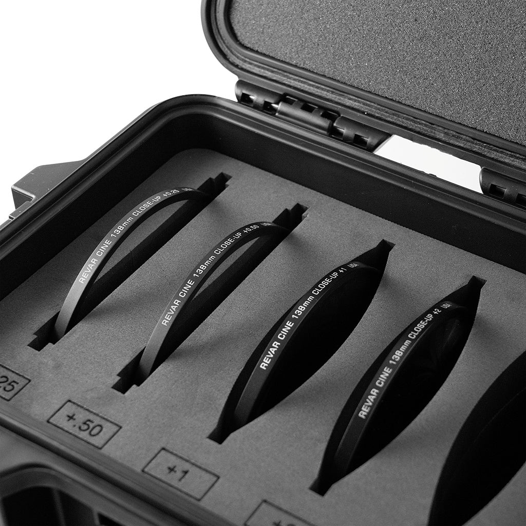Close view of round diopters in labeled foam slots inside a Revar Cine case