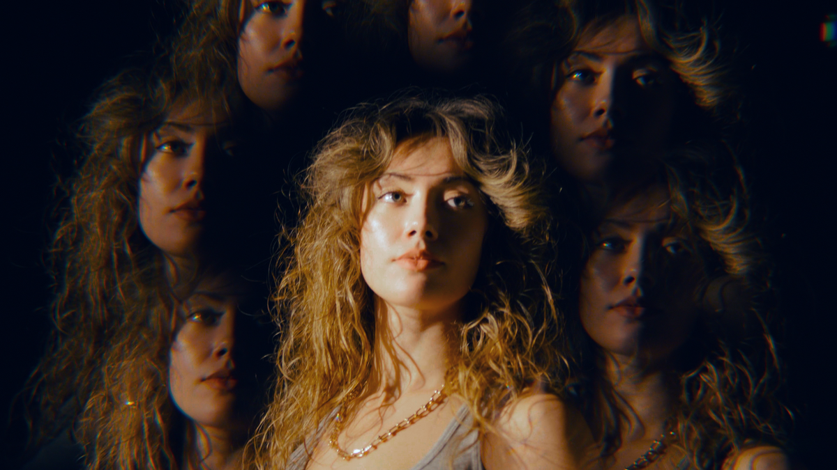 Portrait filmed through the Revar Cine Kaleidoscope-9 filter, with repeated images of the subject surrounding the central face